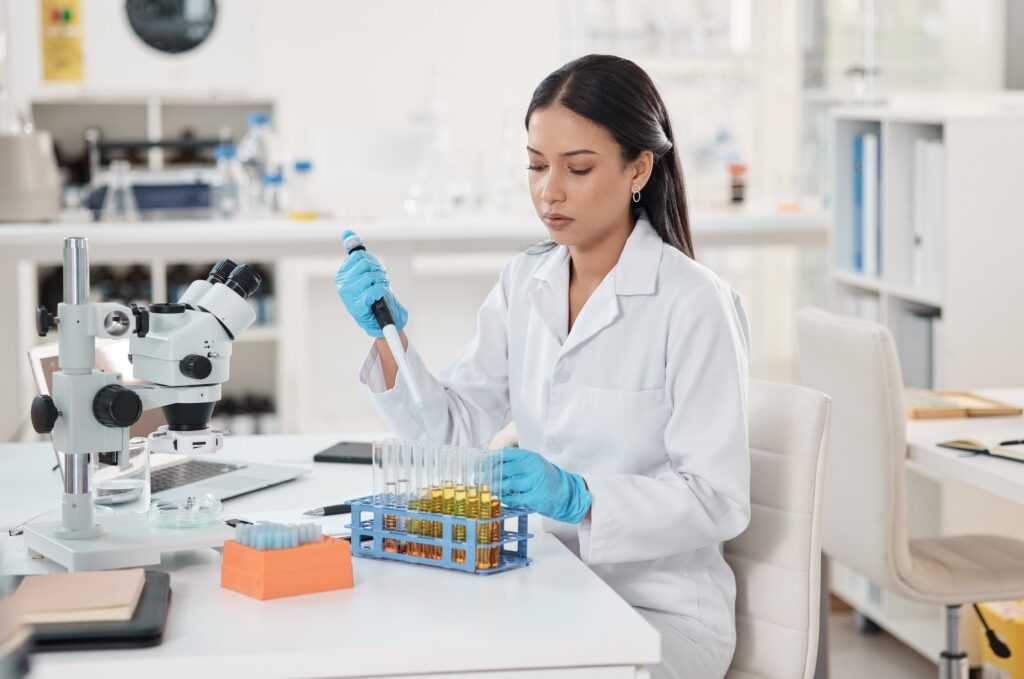 shot-of-a-young-scientist-working-with-samples-in-a-lab.